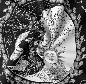 Detailed macro shot of tree of life tapestry showing fine black and white mystic patterns