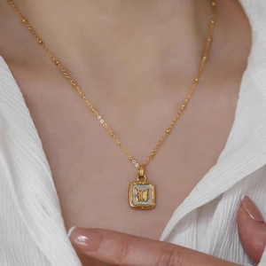 18k gold plated titanium necklace with square mother of pearl butterfly relief pendant