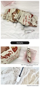 Close-up of cream umbrella with cartoon bear print and premium matte white handle