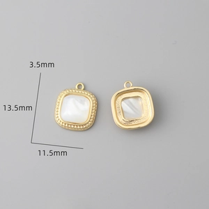 Detailed macro view showing the 13.5mm x 11.5mm dimensions of mother of pearl gold pendants