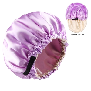 Close-up of double layer satin sleep cap with adjustable strap in purple and beige