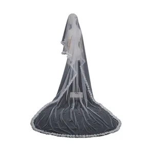 Elegant two-layer white bridal veil with 3D floral lace and pearls on a long train