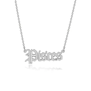 Macro detail of silver Pisces gothic font pendant with delicate stainless steel link chain