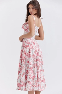 Detailed back view of floral camisole maxi dress with pink flower patterns on white fabric