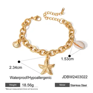 18k gold plated stainless steel bracelet featuring starfish and conch sea shell charms