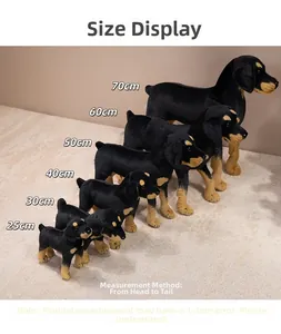 Size comparison of black and tan plush puppy toys ranging from 25cm up to 70cm long