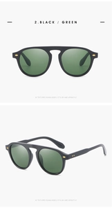 Front and side profile of stylish black sunglasses with translucent green lenses