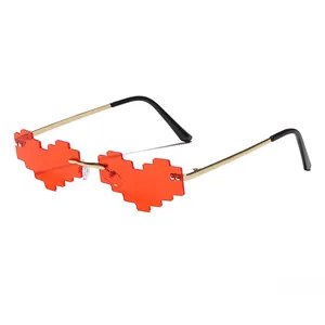 Fashion heart shaped pixel sunglasses with red lenses and gold metal frames shown at 45-degree angle