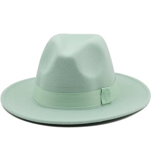 Classic mint green wool fedora hat with matching ribbon band shown from side view
