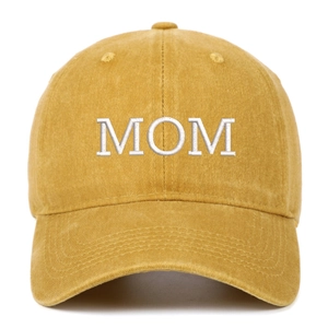 Detail of MOM embroidery on vintage mustard yellow washed cotton baseball cap