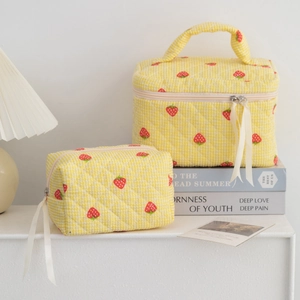 Quilted strawberry print cosmetic bag set with yellow gingham patterns and zip closures