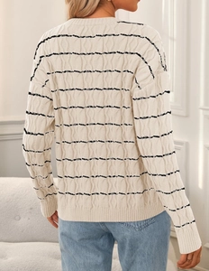 Detail showing back view of long sleeve cable knit cardigan with black stripes