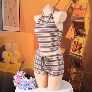Detail of colorful striped halter top and drawstring shorts on a mannequin