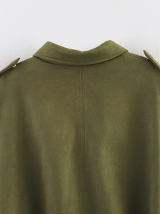 Detailed view of olive green bomber jacket featuring suede texture and epaulettes