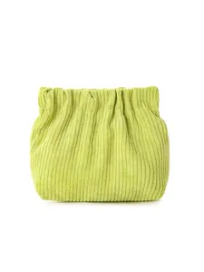 Macro detail of mint green corduroy mini pouch showing ribbed texture and elastic closure