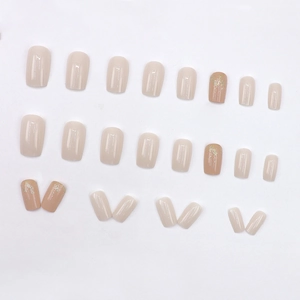 Elegant nude square press-on nails with white jade finish and gold glitter accents