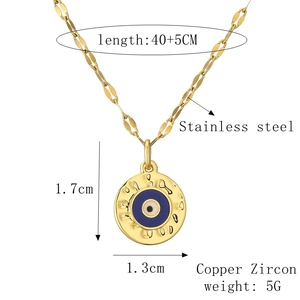 Detailed view of the gold Evil Eye necklace showing 1.3cm pendant size and chain dimensions