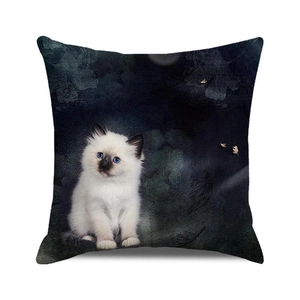 Detail of square pillowcase featuring a cute black cat and dark forest foliage print