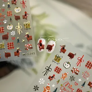 Christmas nail art stickers featuring dachshunds, gingerbread men, and festive bows