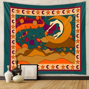 Detail of bohemian rainbow tapestry in living room with vintage floral pattern and warm colors