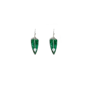 Detail of green arrow drop earrings with silver hooks and delicate white pearl accents
