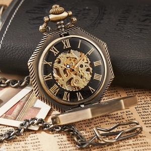 Macro view of vintage hollow hexagonal mechanical pocket watch with bronze gear movement