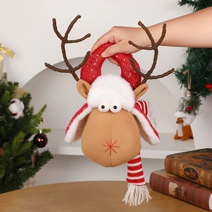 Christmas reindeer gift bag with red sequin handle and striped scarf for festive decor