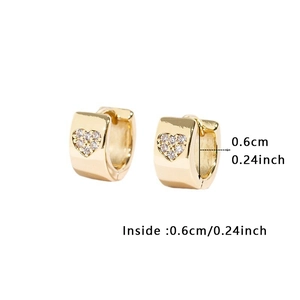 Close-up of gold heart huggie earring with zircon inlay and 0.6cm inner diameter detail