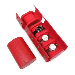 Three-slot red leather watch roll travel case with soft suede lining and snap closures