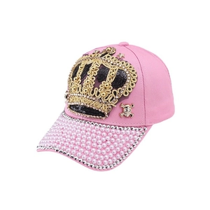 Pink baseball cap with sequined crown, metal skull stud and faux pearl brim for women