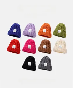 Detailed grid showing 10 vibrant colors of chunky cable knit beanies for women