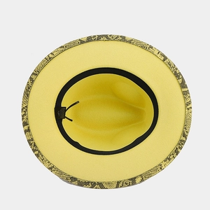 Top view of yellow wool felt fedora with snakeskin pattern brim and adjustable inner band