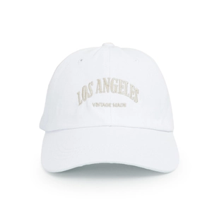 Detailed embroidery of Los Angeles vintage text on a white cotton baseball cap