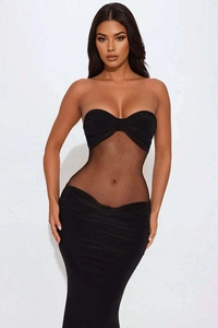 Detail of the sexy black strapless dress featuring mesh patchwork and a bodycon silhouette
