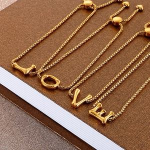 Gold stainless steel bracelet with bamboo texture LOVE letters and adjustable slider clasp