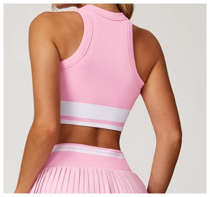 Back view of a seamless pink yoga tank top with ribbed knit texture and white hem stripes