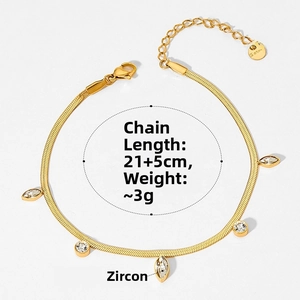 Detail of gold snake chain anklet with sparkling zircon charms and adjustable 21+5cm length