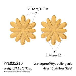 Detailed size view of gold flower earrings with textured stainless steel petals