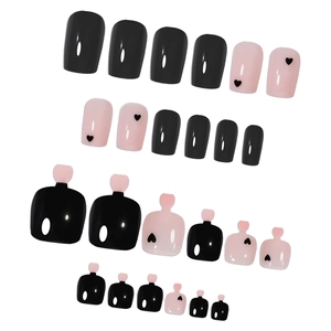 Pink and black press-on nail set for hands and feet with glossy heart patterns