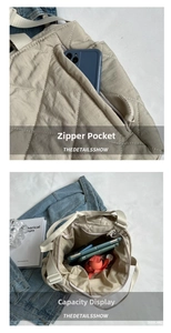 Detailed macro view showing a zipper pocket and large interior capacity of a beige tote bag
