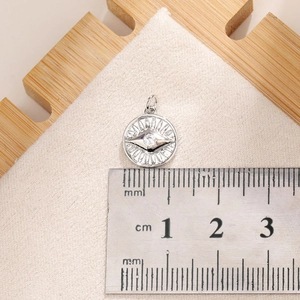 Detailed measurement of a 1.2cm silver devil eye pendant with white zircon and radiating texture
