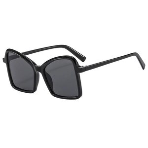 Chic oversized square sunglasses with black glossy frames and dark grey lenses on white background