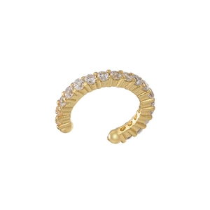 Macro shot of gold C-shaped ear cuff featuring micro-paved sparkling zircon details