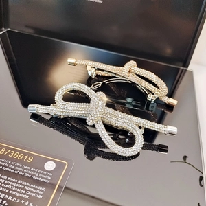 Eleganti fermagli per capelli a fiocco con strass scintillanti in oro e argento