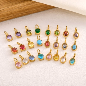 Selection of colorful heart zircon pendants in gold plating for DIY jewelry making