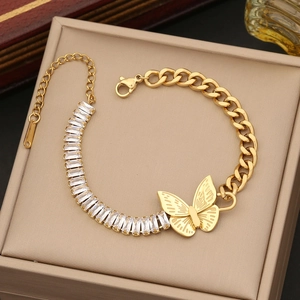 Elegant gold butterfly necklace with square cubic zirconia in a beige jewelry box