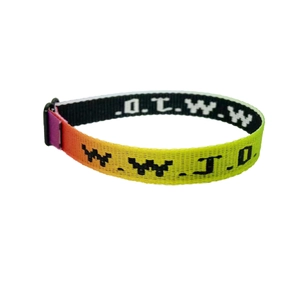 Detailed close-up of WWJD woven bracelet featuring gradient colors and a plastic buckle
