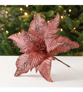 Vue détaillée d'un poinsettia artificiel or rose scintillant pour décoration de Noël