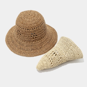 Breathable wide brim straw hat for women with foldable design and crochet hollow pattern