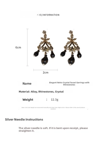 Macro detail of French vintage tassel earrings with dimensions 6cm by 2cm showing rhinestones